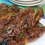picture of asian hawaiian bbq short rib on a white tablecloth