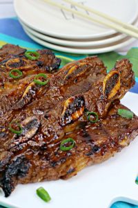 picture of asian hawaiian bbq short rib on a white tablecloth