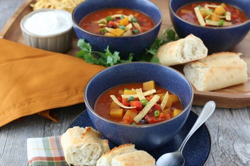 A horizontal view of the finished butternut squash chili recipe finished and ready to be served.