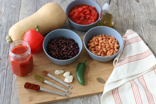 All the ingredients needed to make a vegetarian chili laid out before we start cooking. 