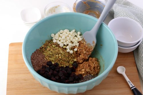The rest of the ingredients for the power balls are mixed into the bowl, ready to be shaped into energy balls. 