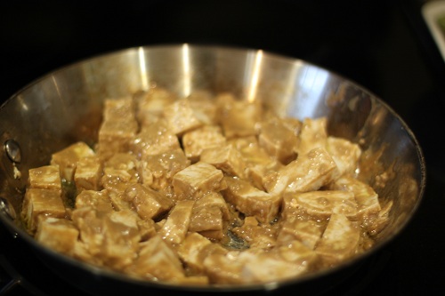 tofu cooking on stovetop